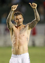 David Beckham shirtless with creepy mustache
